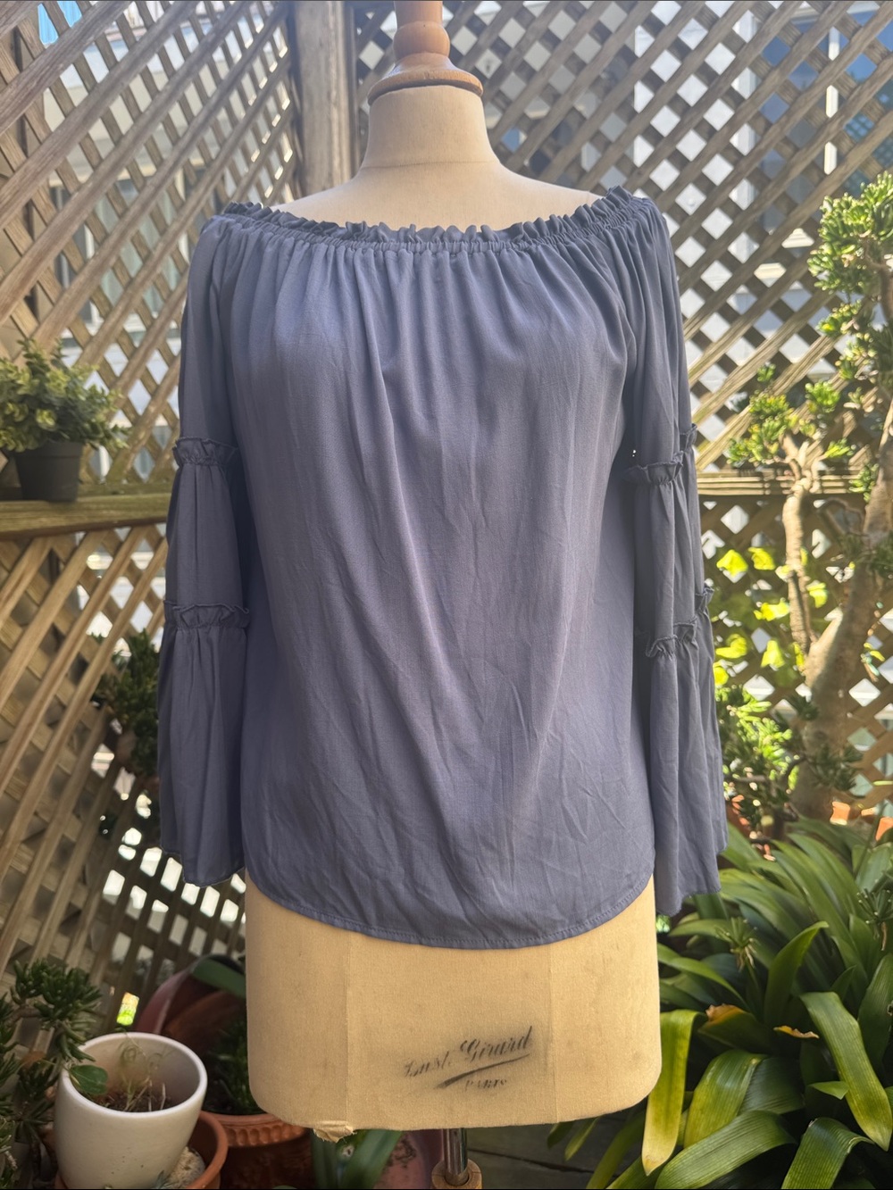 Slate Blue Women's Blouse, elasticized shoulder. Ruffled detailing.